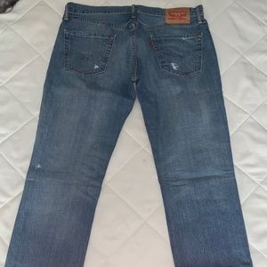 Levi’s 511 distressed jeans
